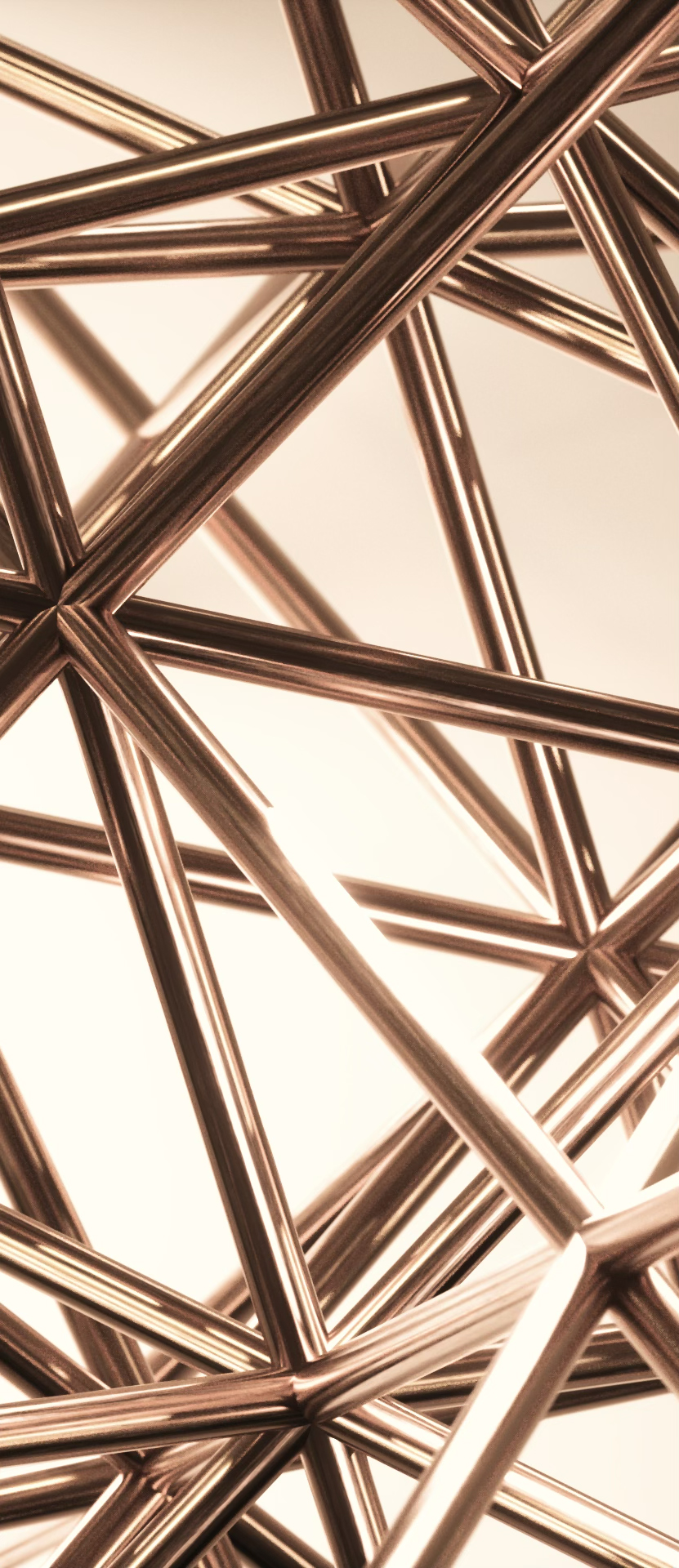 A copper geometric wireframe lattice of interconnected struts against a warm cream background